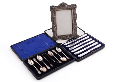 Lot 506 - Early 20th Century silver flatware; and a photograph frame