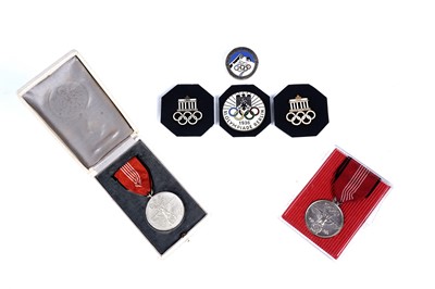 Lot 1164 - A selection of German 1936 Berlin Olympics badges and medals
