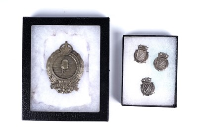 Lot 684 - A Royal Navy Mine Clearance Service cap badge; and three Anti-Submarine Awards