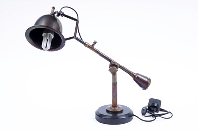 Lot 396 - A brass adjustable desk lamp