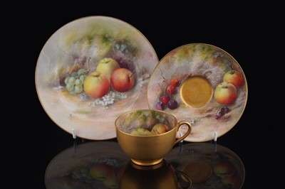 Lot 411 - A Royal Worcester teacup, saucer and plate