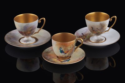 Lot 413 - Three Royal Worcester coffee cups and saucers