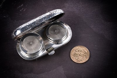 Lot 451 - A George V 1912 gold half sovereign; and an Edwardian silver sovereign case