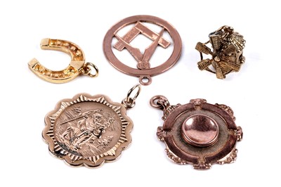 Lot 283 - A group of 9ct gold fobs and charms