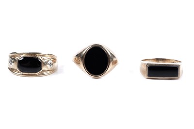 Lot 287 - Three 9ct gold and black onyx signet rings
