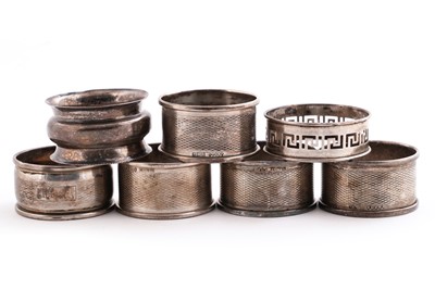 Lot 483 - Seven silver napkin rings