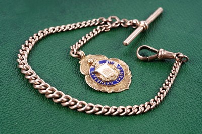 Lot 296 - Newcastle/Football interest: a 9ct rose gold watch chain with 1922-23 Gateshead Charity Cup fob