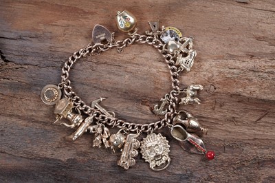 Lot 331 - A 9ct yellow gold charm bracelet
