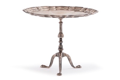 Lot 550 - An Edwardian novelty silver miniature Chippendale style pie crust table