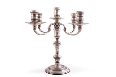 Lot 551 - An Elizabeth II silver four-branch five-light candelabrum