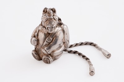 Lot 598 - A contemporary novelty silver charm or keychain modelled as parachuting horse