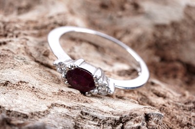 Lot 135 - A contemporary ruby and diamond ring