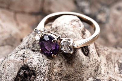 Lot 136 - A contemporary amethyst and white sapphire ring