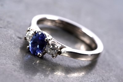 Lot 141 - A contemporary diamond three-stone ring