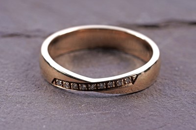 Lot 150 - A contemporary diamond set band