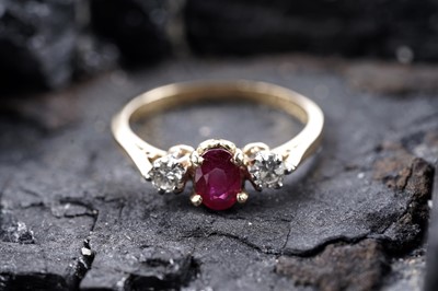 Lot 154 - A contemporary ruby and diamond ring