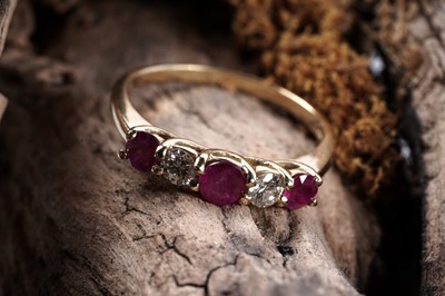 Lot 166 - A five-stone ruby and diamond ring