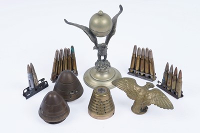 Lot 352 - A collection militaria; with an inkstand; and brass eagle