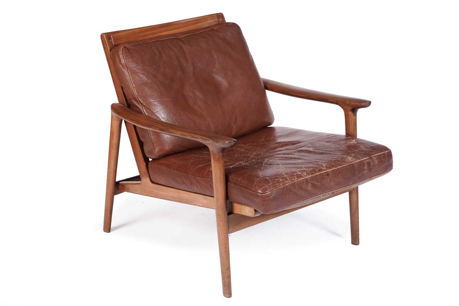 Lot 39 - Guy Rogers: an afrormosia framed ‘New Yorker’ armchair