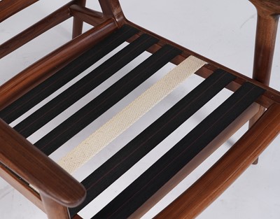 Lot 39 - Guy Rogers: an afrormosia framed ‘New Yorker’ armchair