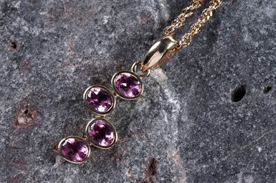 Lot 204 - A contemporary pink tourmaline pendant necklace