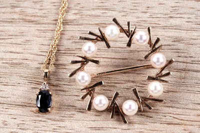 Lot 210 - A sapphire and diamond pendant; and a cultured pearl brooch