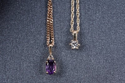 Lot 211 - A diamond solitaire pendant; and an amethyst and diamond pendant necklace