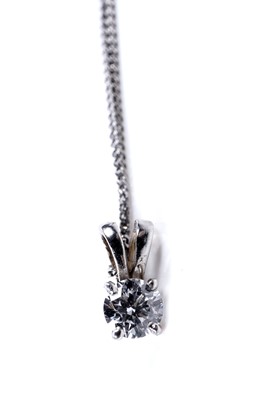 Lot 215 - A solitaire diamond pendant necklace