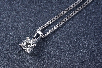 Lot 217 - A solitaire diamond pendant necklace