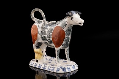 Lot 362 - A pearlware cow creamer