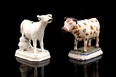 Lot 365 - Two cow creamers
