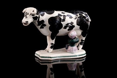 Lot 366 - A cow creamer