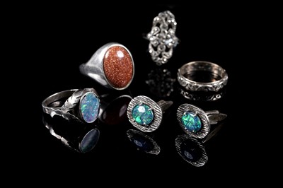 Lot 127 - Arts and Crafts style rings and a pair of cufflinks