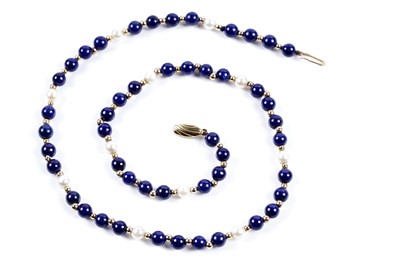 Lot 338 - A lapis-lazuli, cultured pearl, and 9ct gold bead necklace
