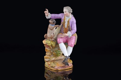 Lot 462 - A Meissen figure of a gallant and pug