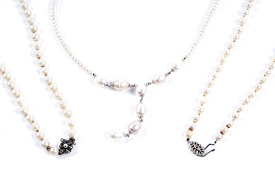 Lot 355 - Cultured pearl necklaces; one with a 9ct white gold clasp