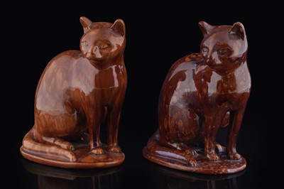 Lot 383 - Two treacle glazed cats