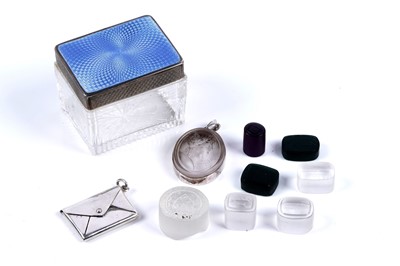 Lot 522 - Intaglio seals and a silver stamp case, contained within a silver mounted cut glass box
