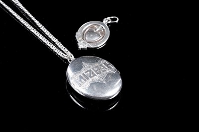 Lot 371 - A Victorian white metal "Mizpah" locket, on chain; and a silver fob medallion