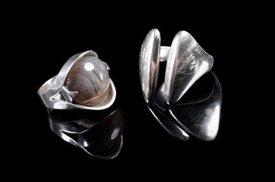 Lot 373 - A Danish Modernist silver ring designed by Hans Hansen; and a 1960's agate and silver ring