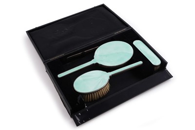 Lot 566 - An early 20th Century Art Deco celadon green guilloche enamelled silver dressing table set