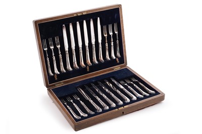 Lot 481 - An Edwardian cased set of silver pistol-handled fruit knives and forks