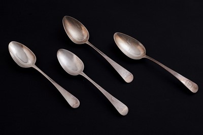 Lot 496 - Four Georgian silver Old English pattern table spoons