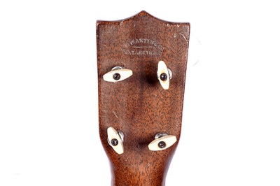 Lot 46 - A Martin style 3K soprano ukulele; and two cases, one original