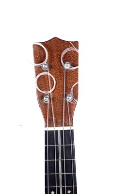Lot 46 - A Martin style 3K soprano ukulele; and two cases, one original
