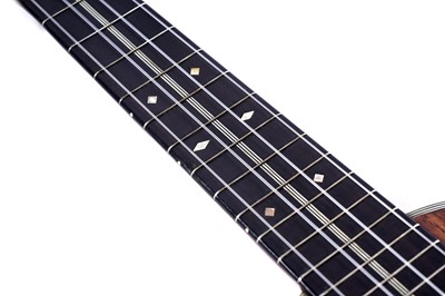 Lot 46 - A Martin style 3K soprano ukulele; and two cases, one original