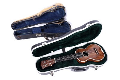 Lot 46 - A Martin style 3K soprano ukulele; and two cases, one original