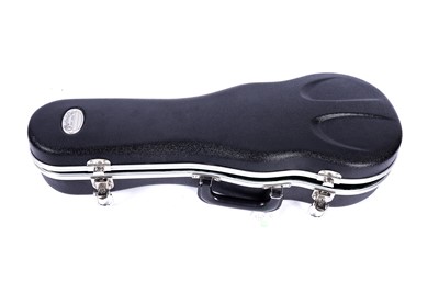 Lot 46 - A Martin style 3K soprano ukulele; and two cases, one original