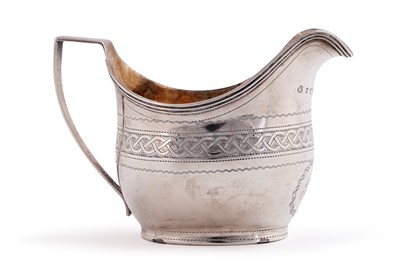 Lot 557 - A George III silver milk jug
