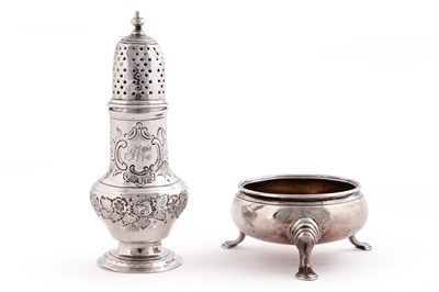 Lot 531 - A George II silver pepperette; and a cauldron form salt